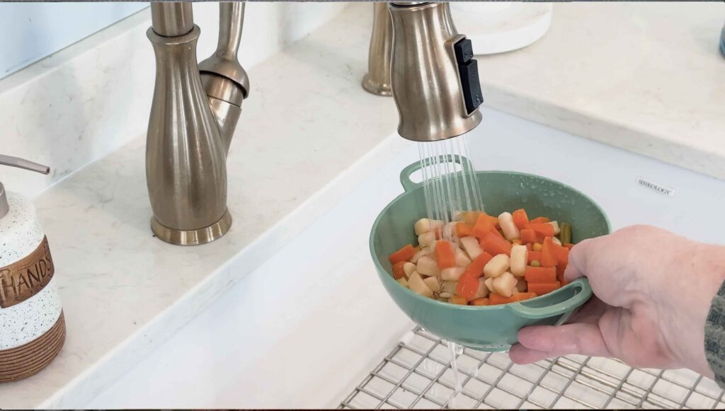 Rinsing canned vegetables before cooking to reduce sodium