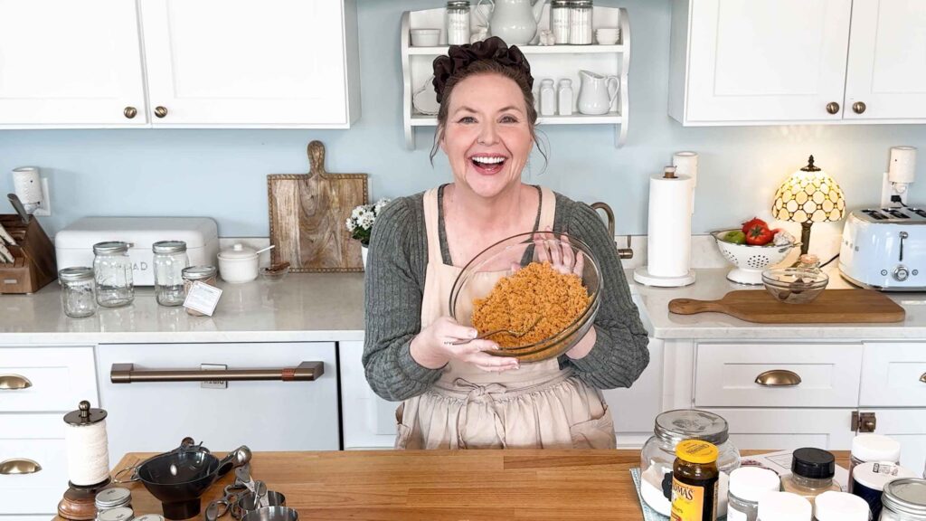 Jennifer holding a bowl of homemade brown sugar