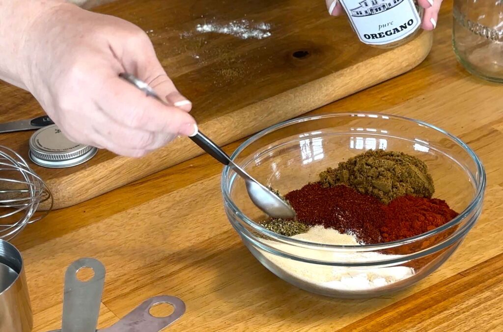 Measuring ingredients to make a batch of taco seasoning
