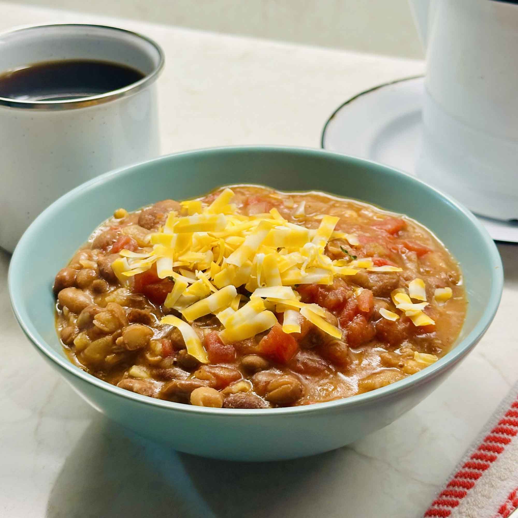 Chili with coffee, topped with cheese