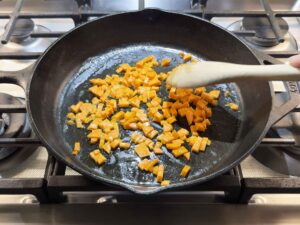 Cooking carrots in butter in skillet