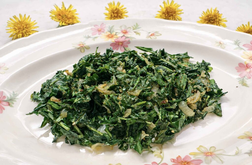 Fried dandelion greens on a vintage platter