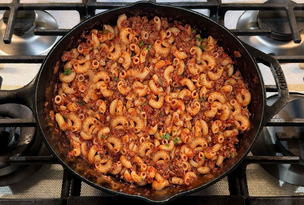 easy American goulash in a cast iron skillet