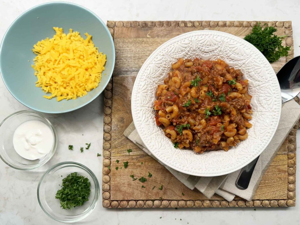 Cheddar cheese, sour cream and parsley for goulash toppings