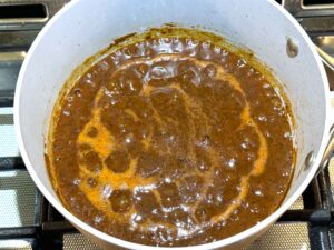 Chicken broth added to the sauce mixture