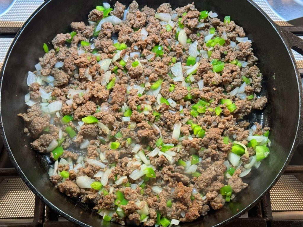 Added green peppers and onions to the meat