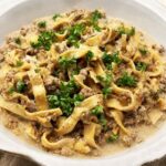 Ground beef stroganoff in a white bowl