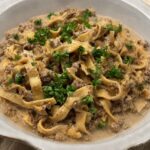Ground beef stroganoff in a white bowl