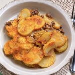 Hobo casserole in a bowl with a fork