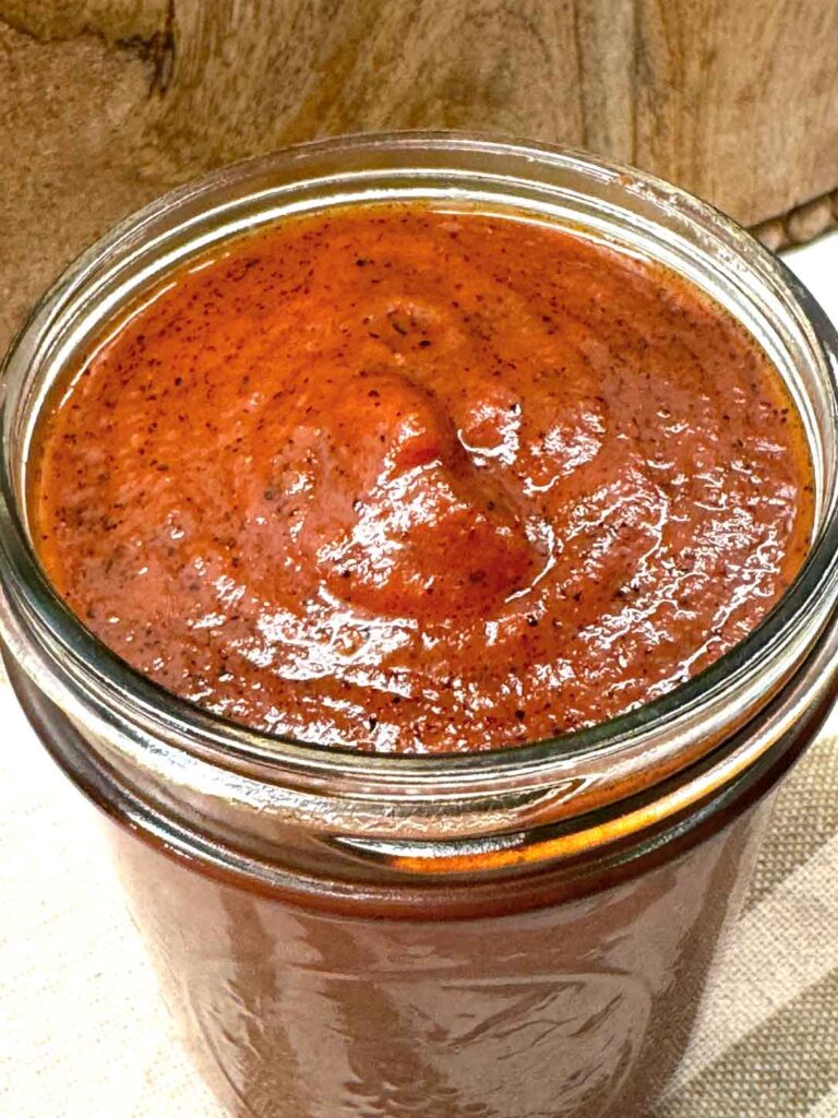 Closeup of the red enchilada sauce in a jar