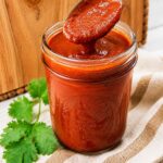 Homemade Red Enchilada Sauce in a Mason jar