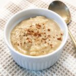 Old-fashioned rice pudding in custard cup