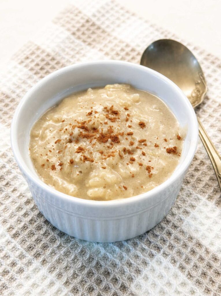 Old-fashioned rice pudding in custard cup