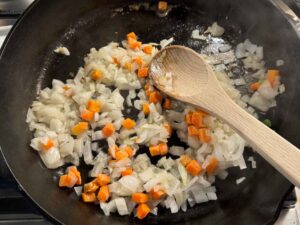 Softening the vegetables in a skillet