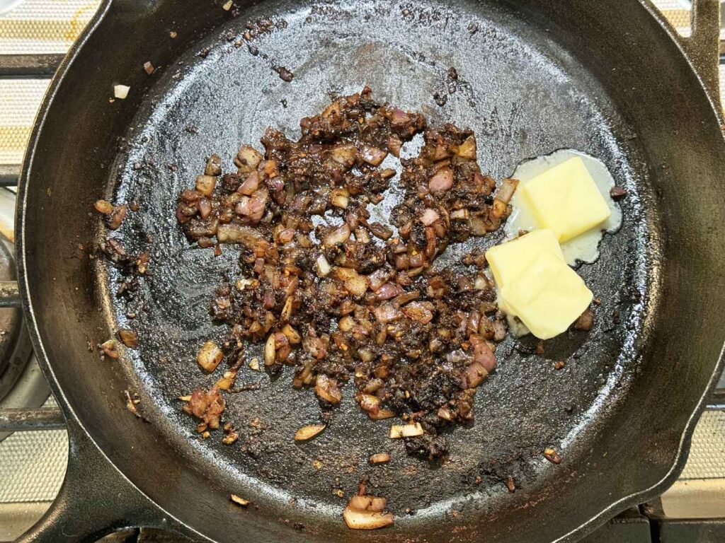 Adding butter to the skillet