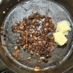 Adding butter to skillet