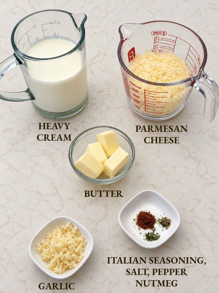 Ingredients for alfredo sauce: heavy cream, parmesan cheese, butter, garlic, italian seasoning