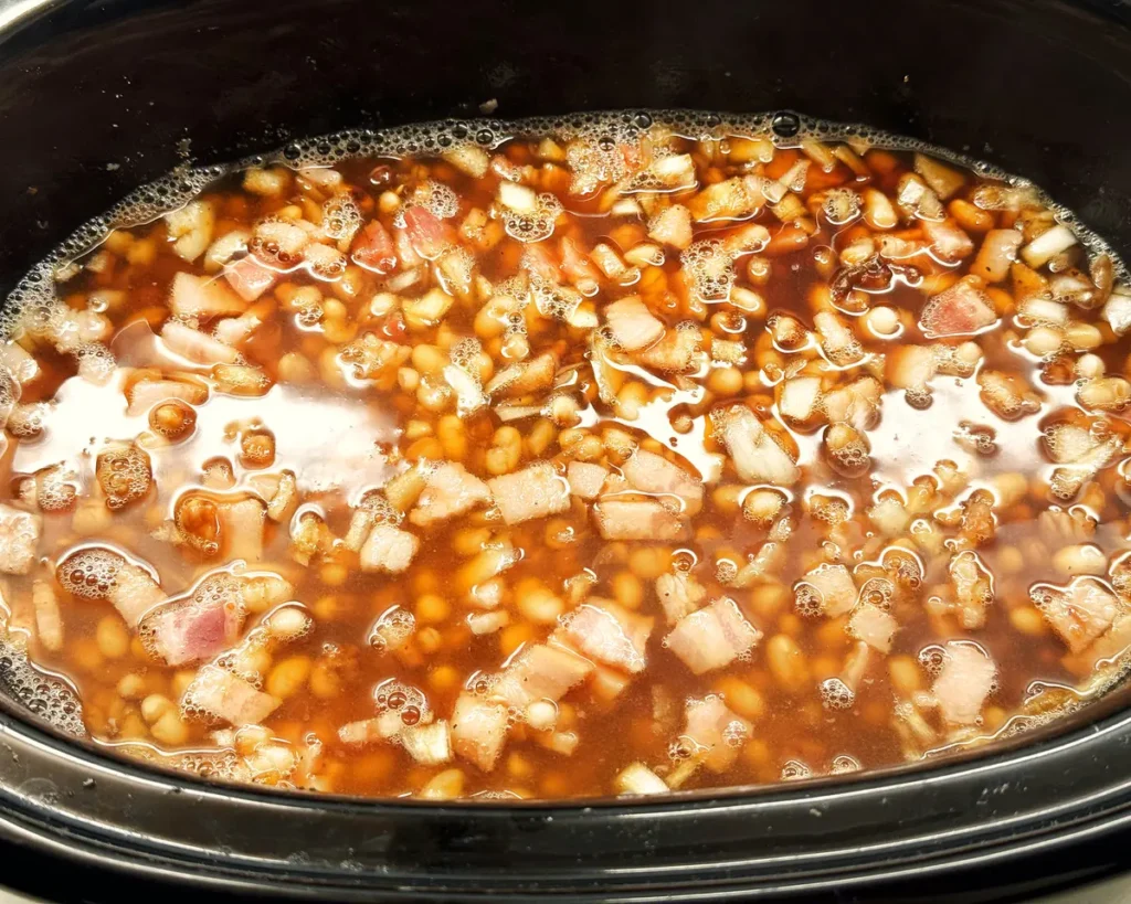 Baked bean cooking in the crockpot