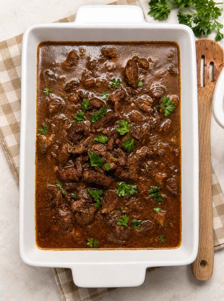 Beef tips and gravy in a serving dish