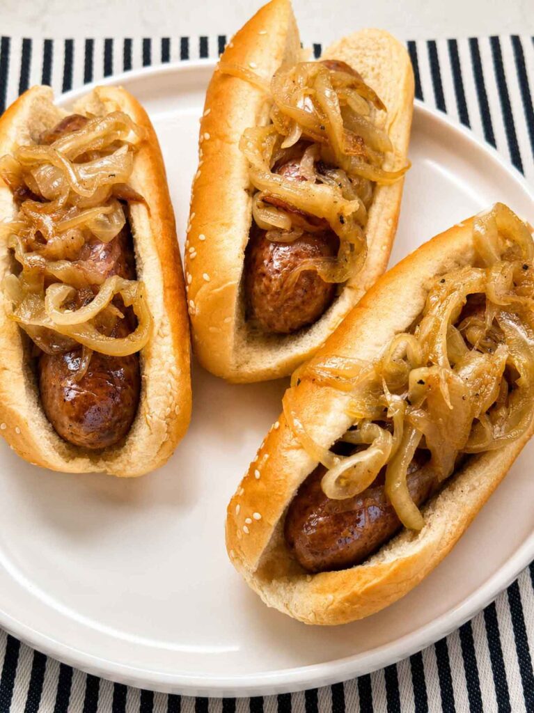 Beer brats with onions in buns