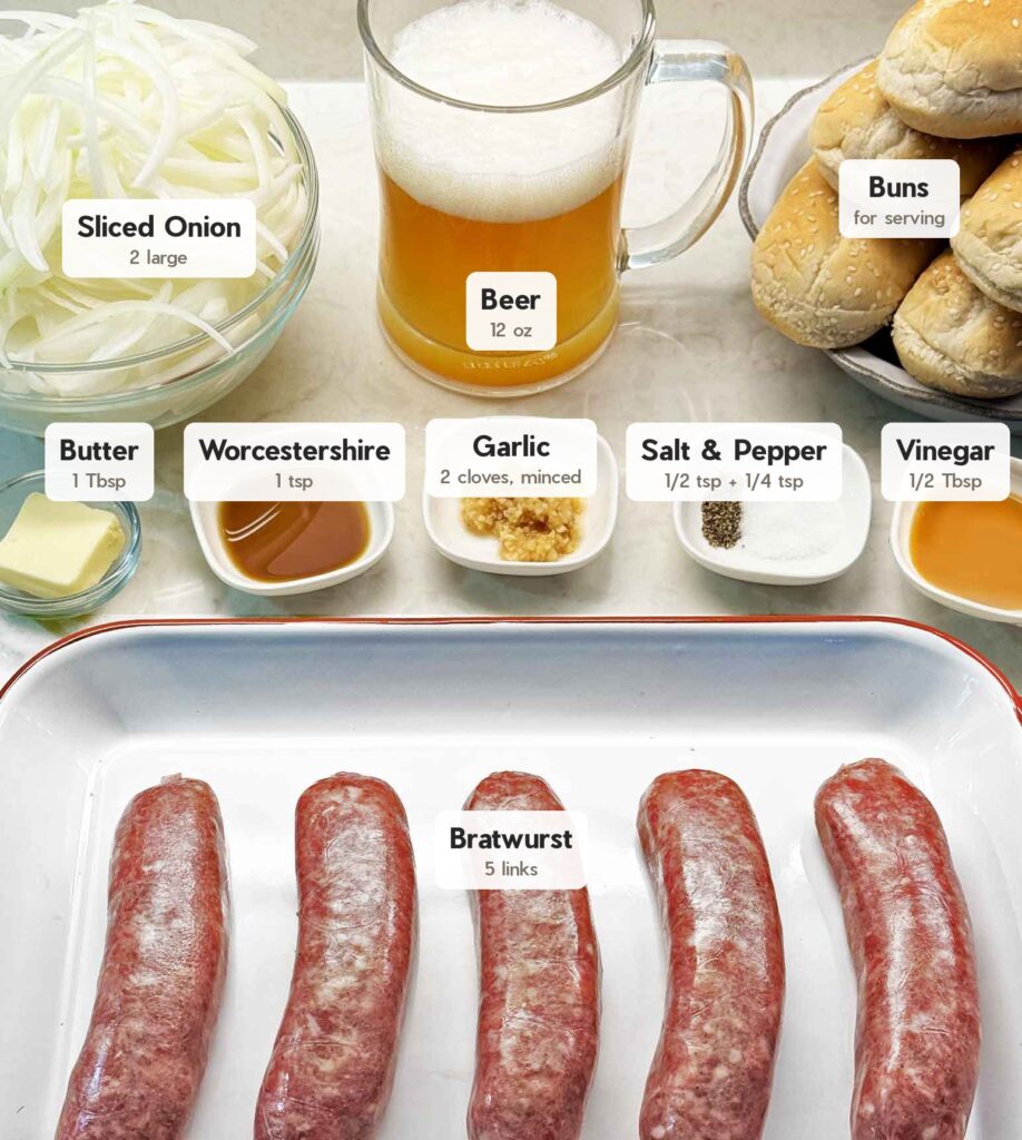Ingredients for beer brats including onions, buns, seasonings, vinegar, and butter