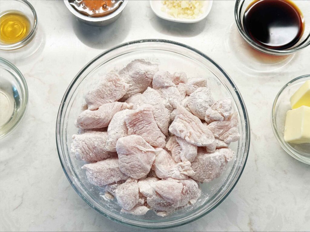 Bite-sized chicken tossed with flour, salt, and pepper