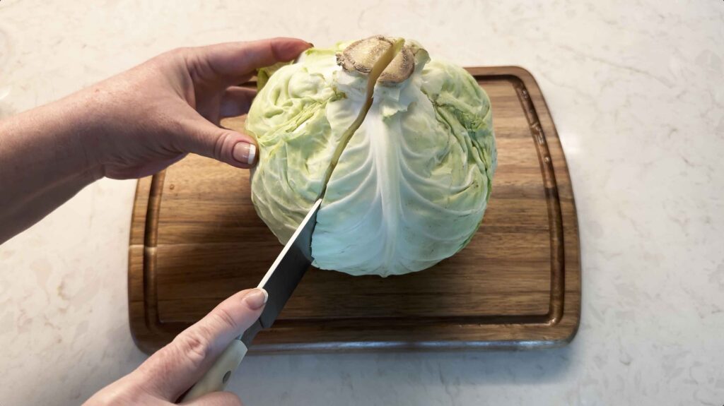 Cutting cabbage in half
