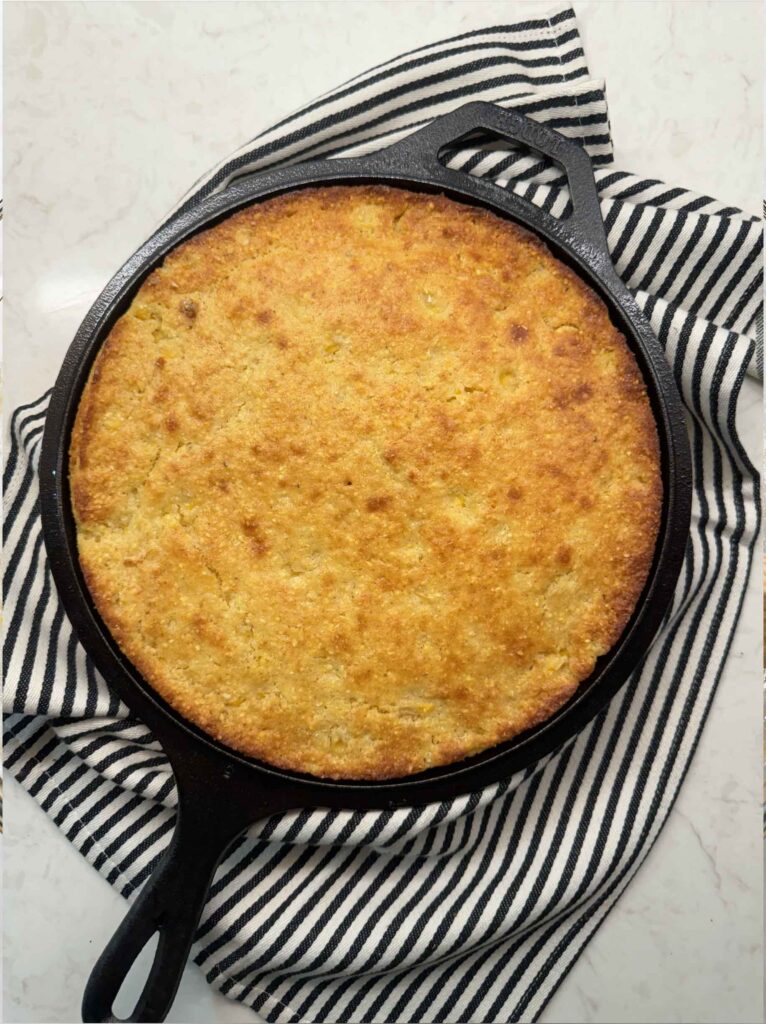 Baked cornbread in a cast iron skillet