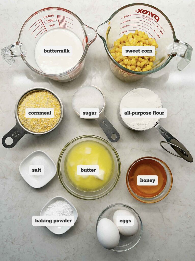 Ingredients for the cornmeal recipe in bowls and measuring cups