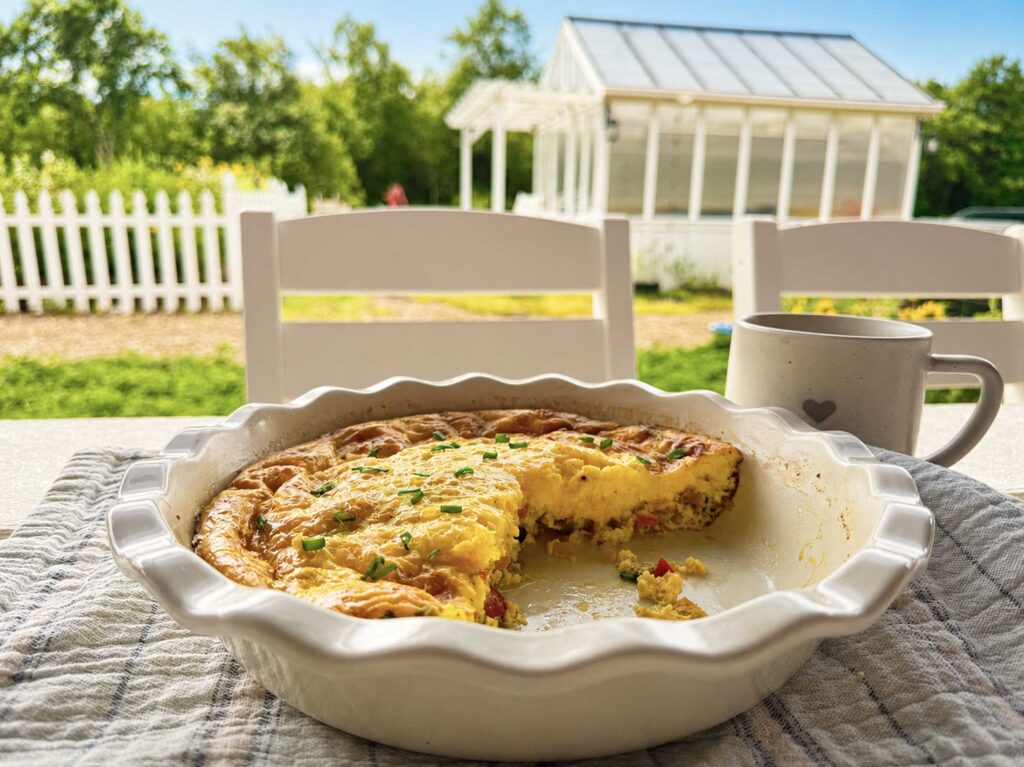 Crustless quiche on the patio table on Maker Farm