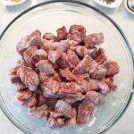 Meat coated in flour, salt, and pepper