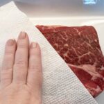 Patting the beef dry