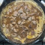 simmering beef in skillet