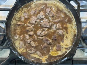 simmering beef in skillet