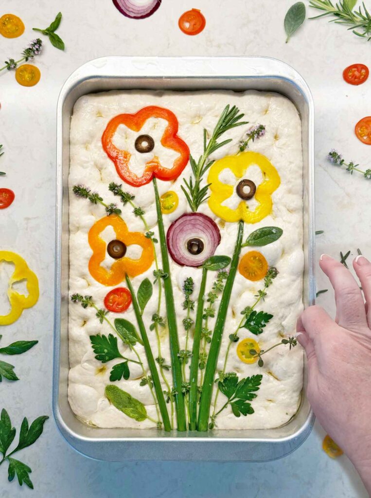 Sourdough Focaccia Art Before Baking - Wildflowers with vegetables and herbs
