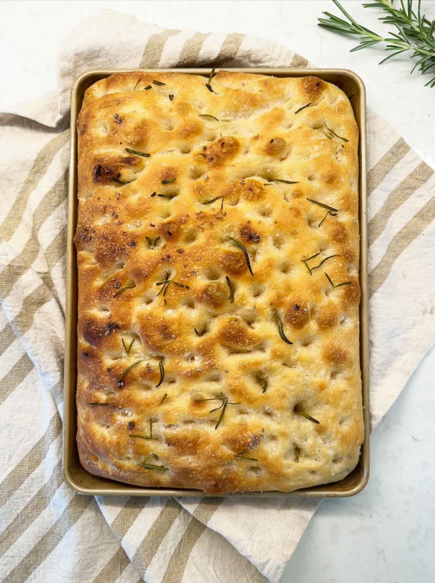 Sourdough Focaccia with olive oil, flaky salt, and rosemary