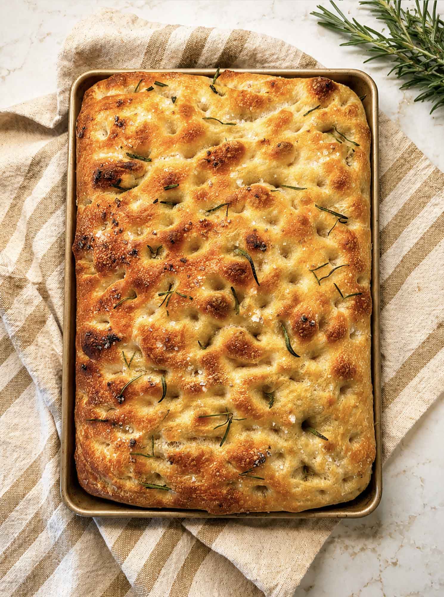 Sourdough Focaccia with olive oil, flaky salt, and rosemary