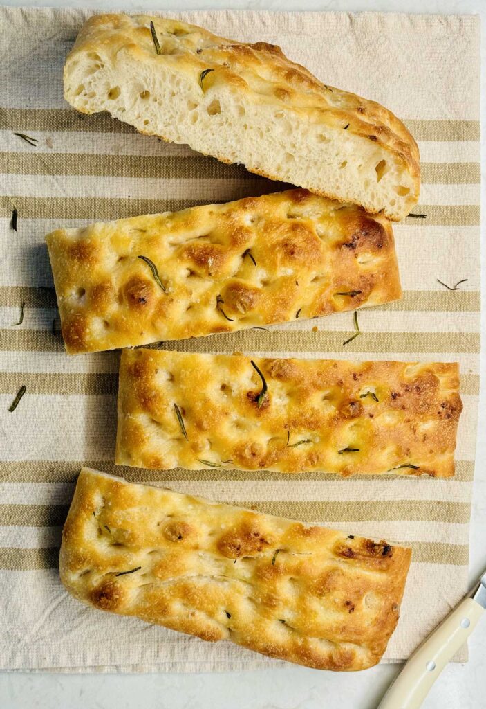 Slices of sourdough focaccia bread, airy and light