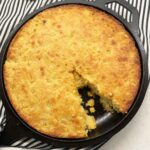 Moist cornbread in a cast iron skillet
