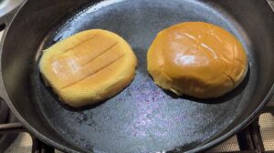 Toasting buns on a cast iron surface