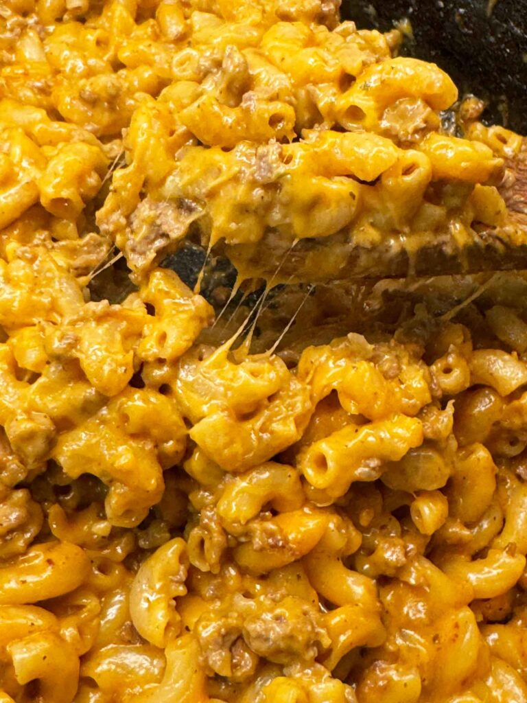 Cheesy homemade hamburger helper being served
