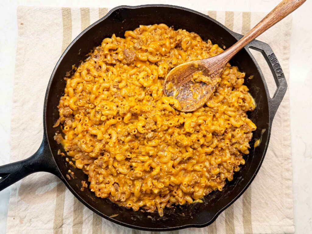 Homemade Hamburger Helper in skillet with spoon