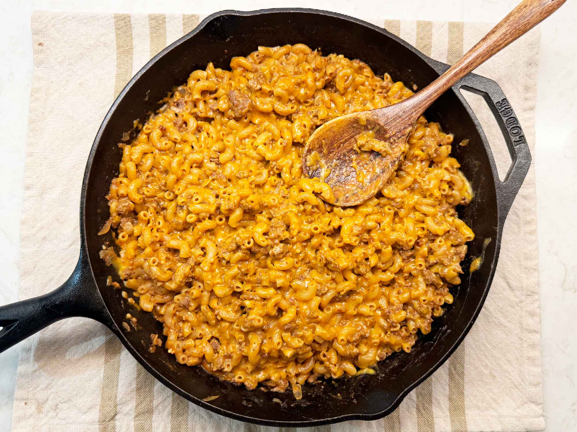Homemade Hamburger Helper in skillet with spoon