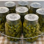Jars of raw-pack green beans processed and labelled