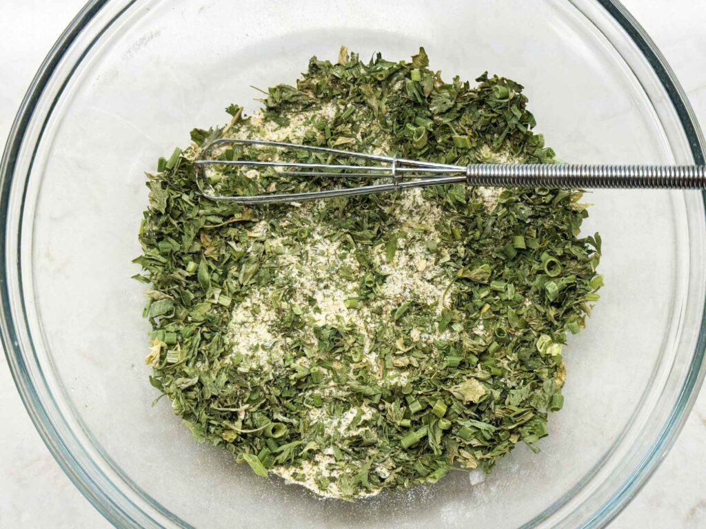 Mixing the ingredients for ranch seasoning in a bowl