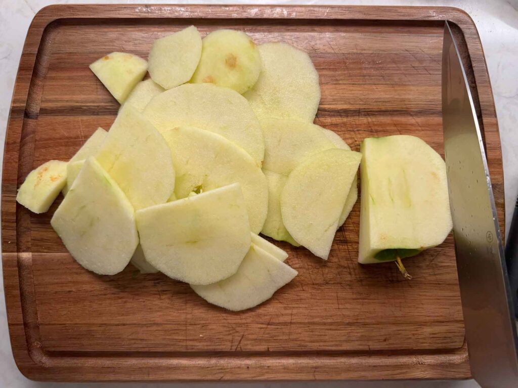Slicing apples 1/4" thick for apple crisp