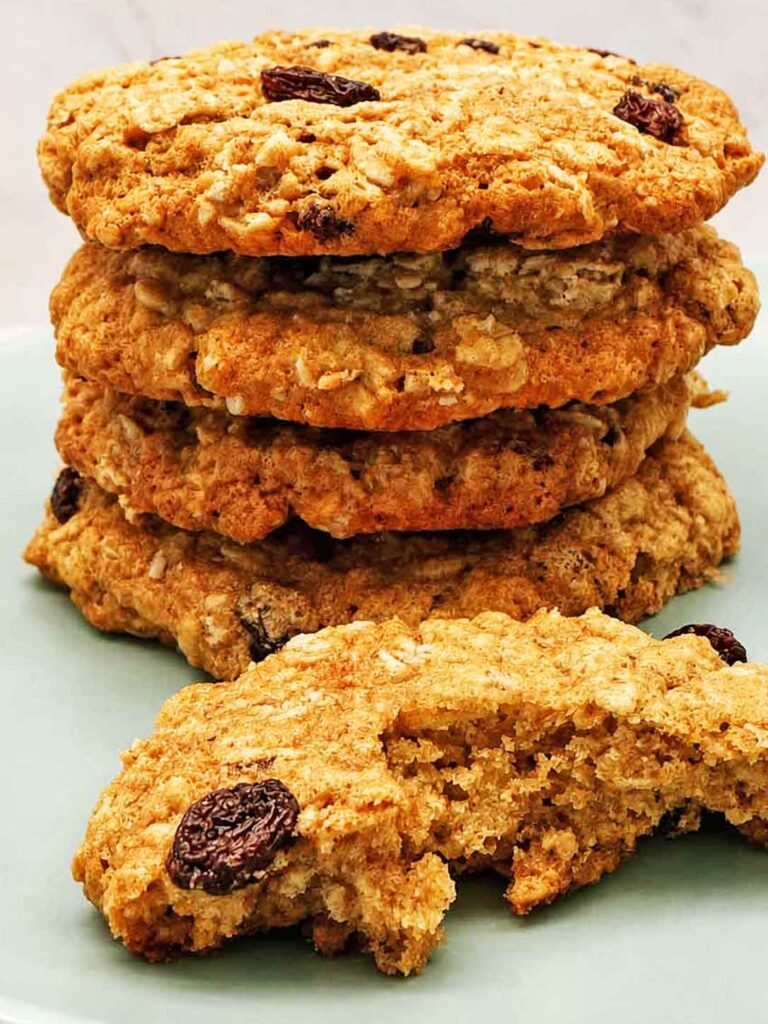 Stack of soft sourdough oatmeal cookies on a plate