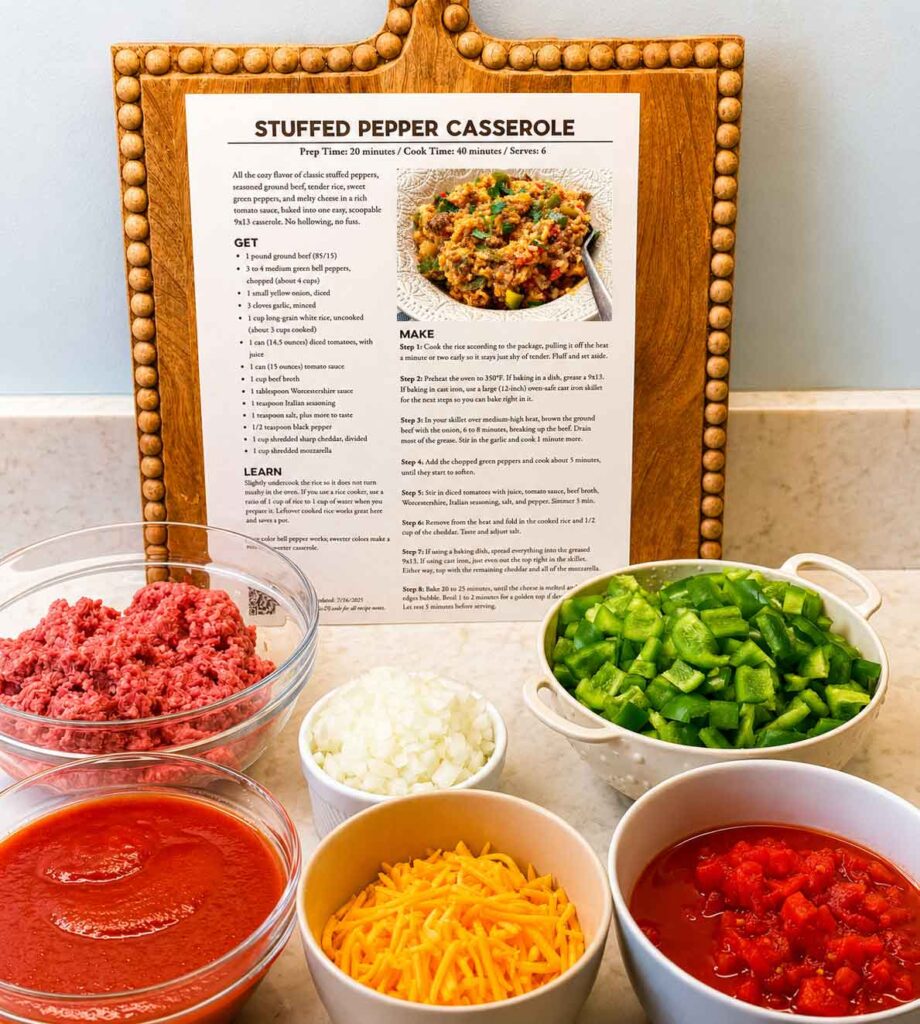 Maker Home Companion cookbook page on the counter with meal prep bowls