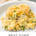 Chicken noodle casserole in a bowl with a casserole dish in the background