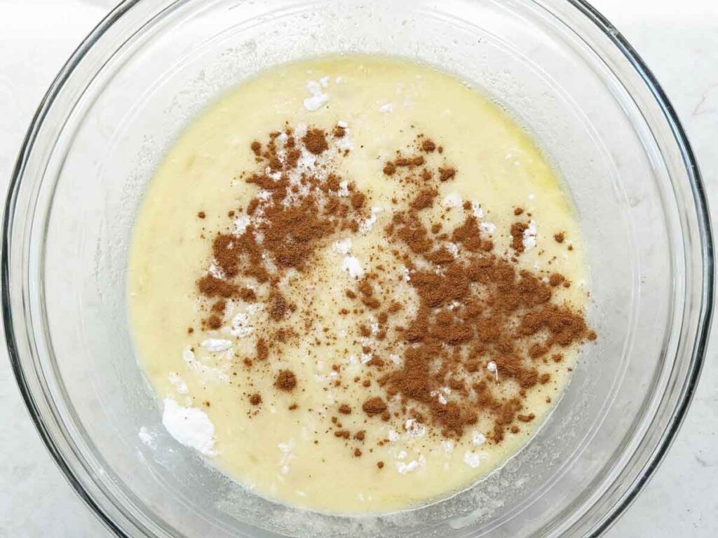 Cinnamon and baking soda sprinkled over banana bread batter before folding in the flour